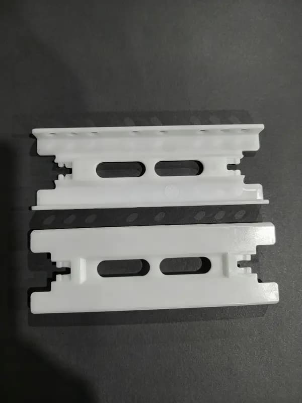 Toughened nylon refrigerator drawer slide made with impact-modified PA